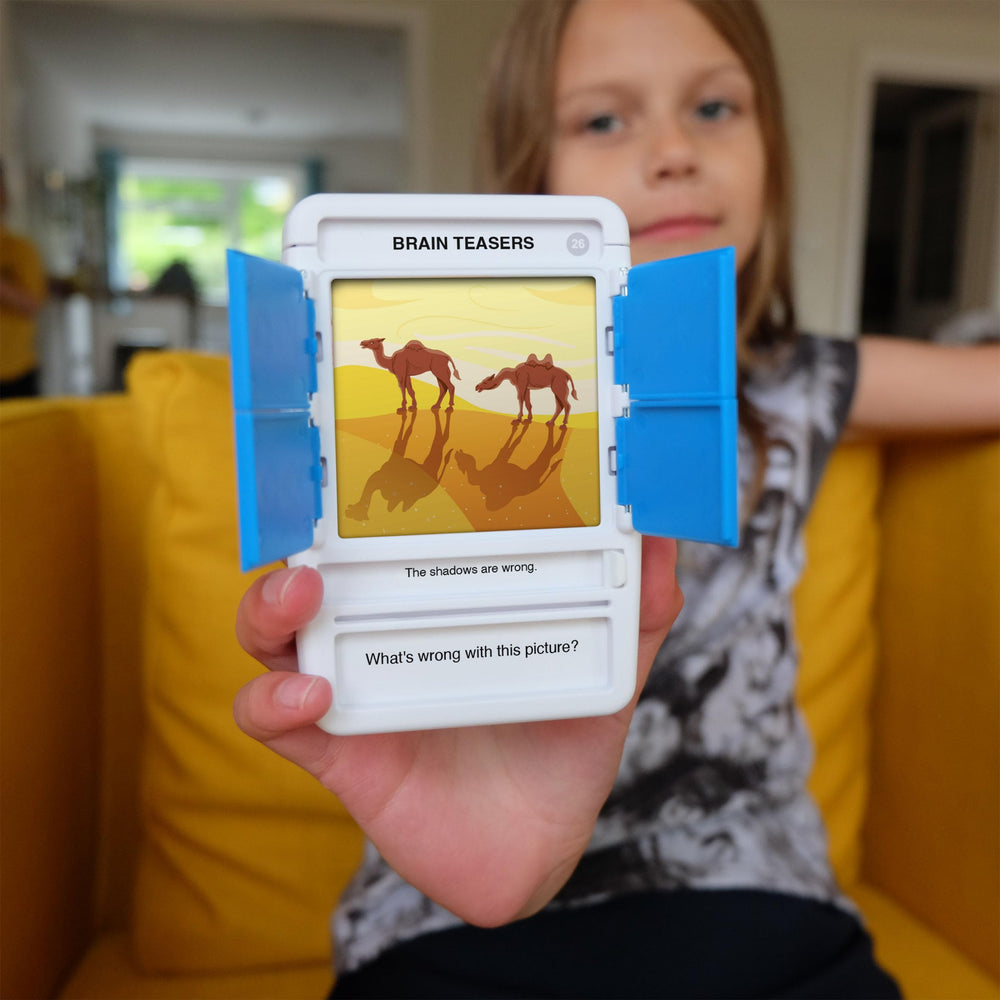 100 PICS Brain Teasers pocket-sized travel set tucked into bag for quick challenges
