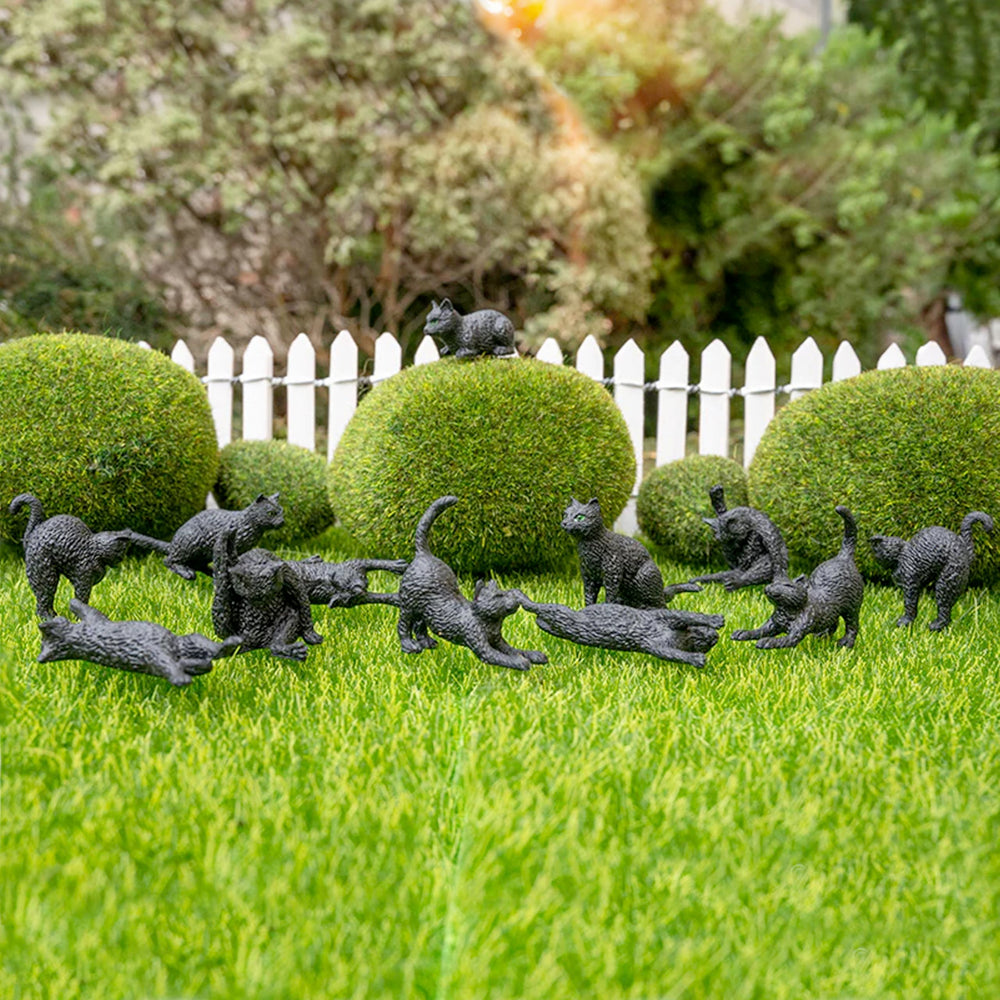 Soft vinyl mini cats from Accoutrements for desk or shelf display