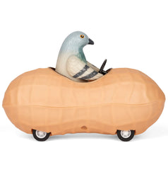 Accoutrements Archie Mcphee pigeon peanut pull-back car in soft vinyl for playful desk decor and conversations.