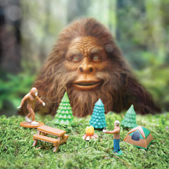 Accoutrements Bigfoot Basecamp scene elements including trees and campfire for creative play.