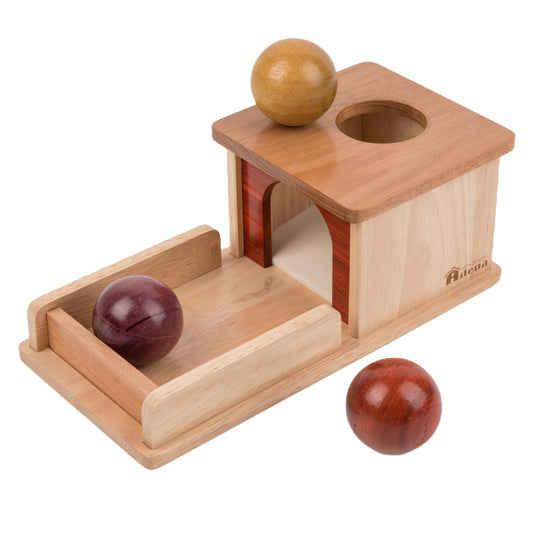 Adena Montessori object permanence box with wooden balls for early sensory learning.