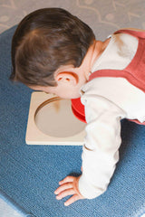 Adena Montessori spinning drum enhances focus and fine motor engagement during play.