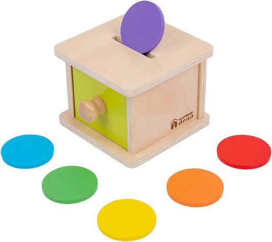 Adena Montessori coin box with wooden discs for color and shape sorting.