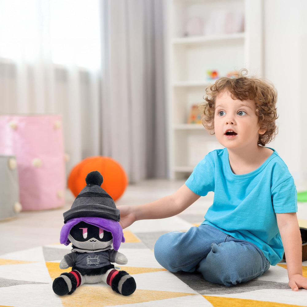 Adenzai Uzi plush travel companion—easy to carry on adventures.