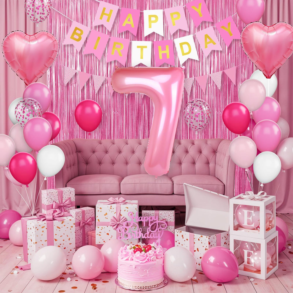 Adorely pink cake topper provides a sweet accent for the birthday cake.