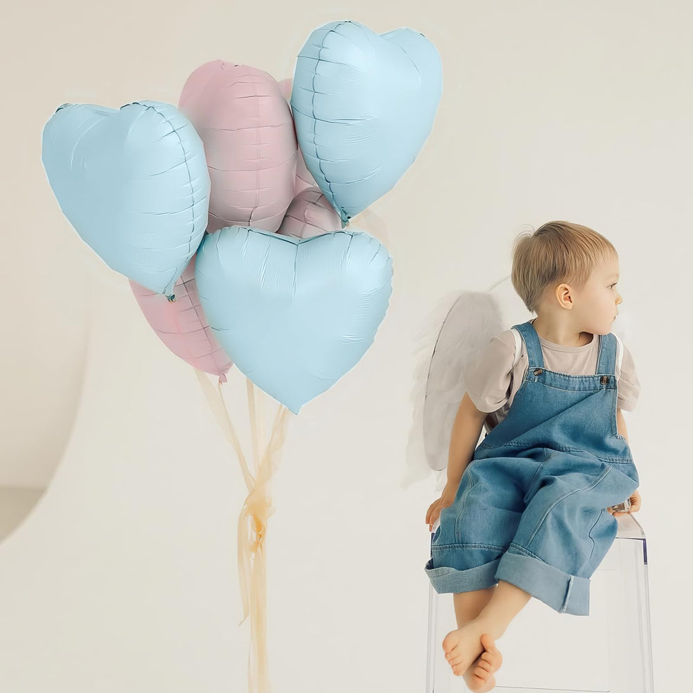 Adorely blue heart foil balloon closeup showcases delicate pastel shine