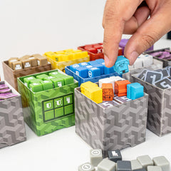AEG Cubitos ability cards spread showing strategic options.