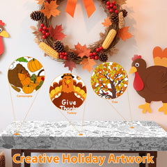 AinDen fall leaves pattern on table cover for holiday ambiance.