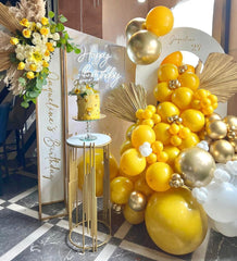 Aiwolf gold-confetti balloons add sparkle to arches, backdrops, or balloon bouquets.