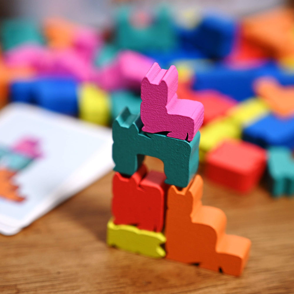 Close-up of Alley Cat Games Kittin cat meeples for quick stacking challenges.