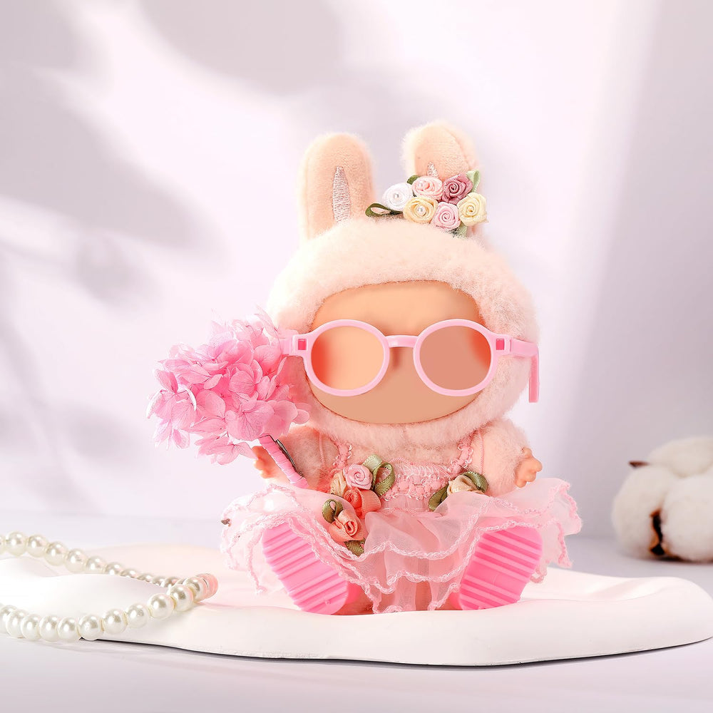 ALTRJO 17cm doll hairband in pink completes the coordinated outfit.