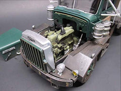AMT Autocar Dump Truck scale model showcases classic design for display shelves.
