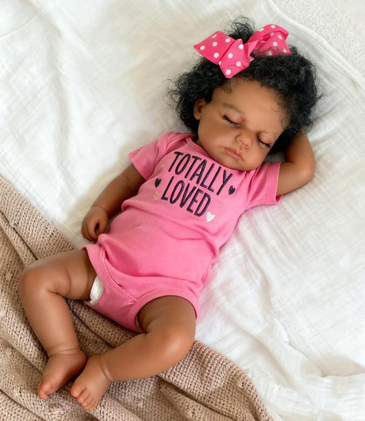 Anano black reborn doll face close-up showing lifelike features for imaginative play