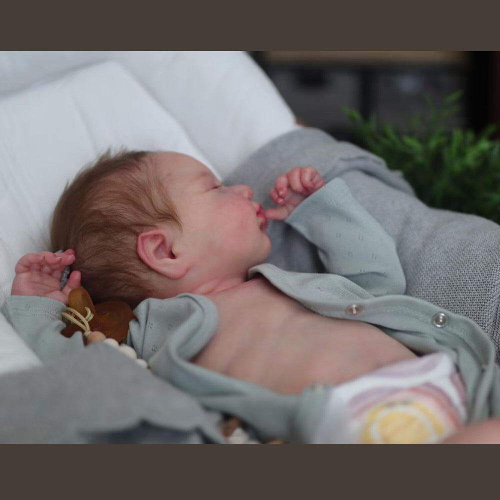 Anano Reborn Baby Boy 17 inch dressed-in-clothes image showcasing interchangeable outfits