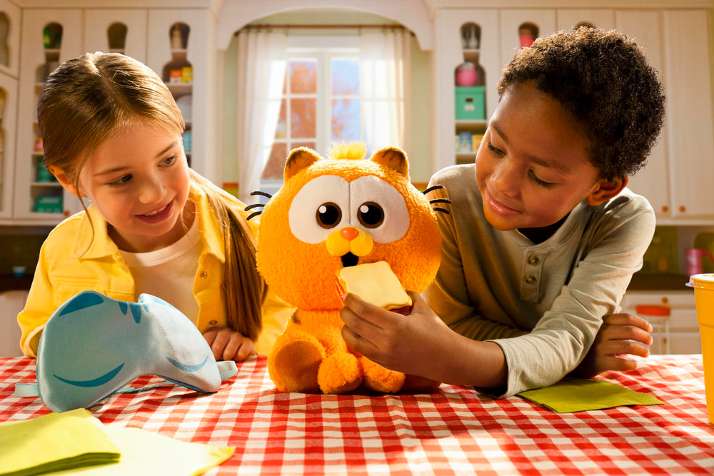 Animagic Baby Garfield sleeping with mask for soothing nap time.
