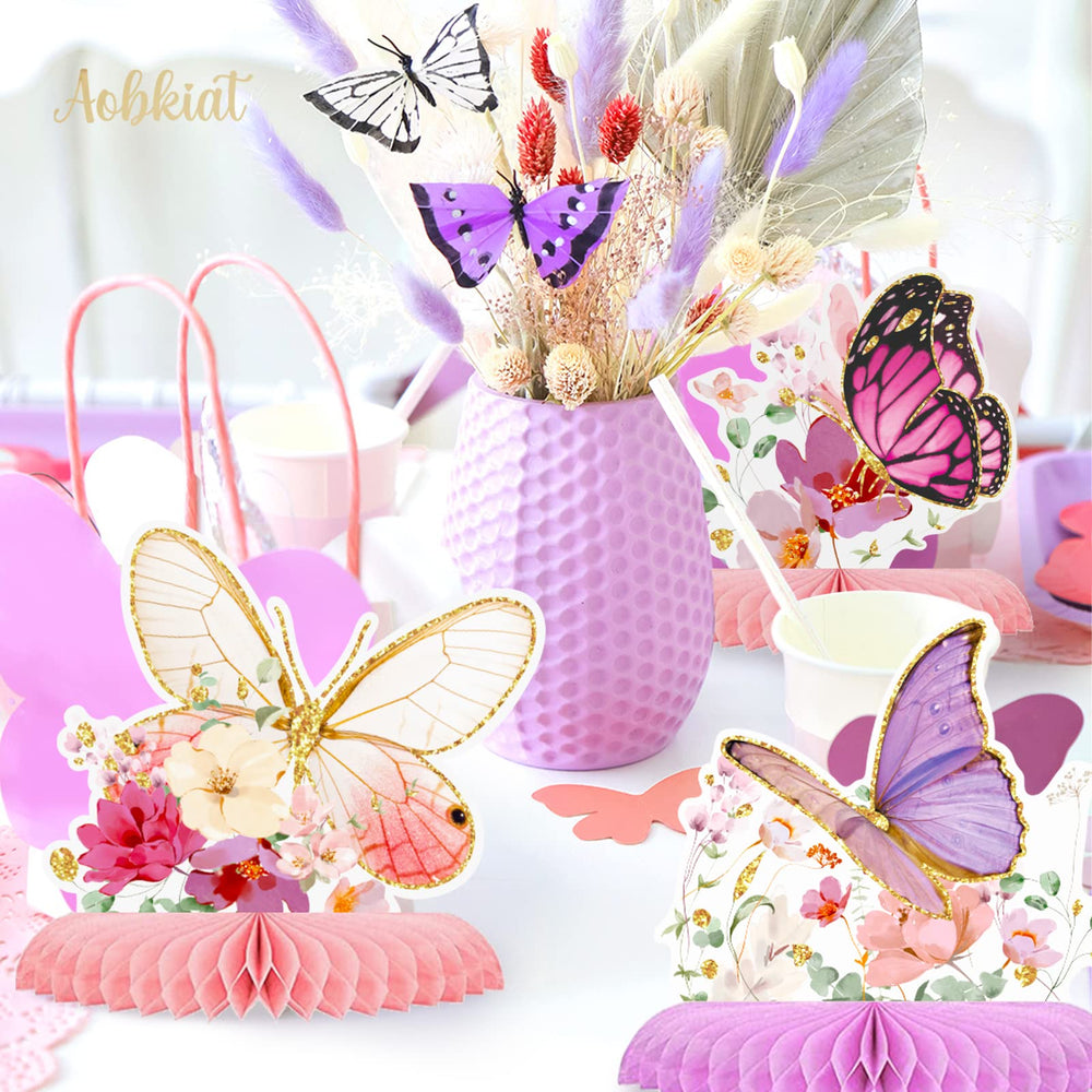 Aobkiat butterfly honeycomb centerpiece in lavender enhances wedding reception ambiance.