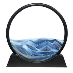 Aoderun moving sand art in round blue glass for relaxing desktop ambiance.