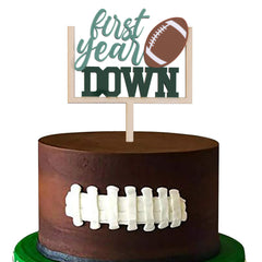 AOQURE wooden first-year football cake topper on a cake for a memorable 1st birthday