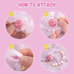 Easy clean pacifier clip being wiped with warm cloth