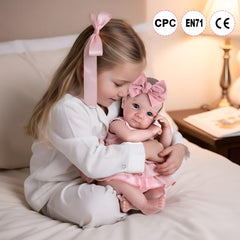 Aori Real Life Reborn Doll with poseable limbs and soft cloth body for easy posing.