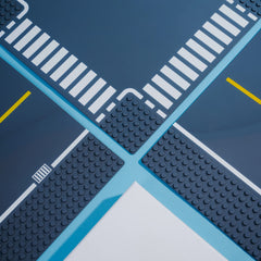 Apostrophe Games curved gray road baseplate for smooth bends.