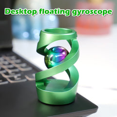Apqdw kinetic ball rests on workspace for mindful use.