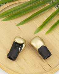 AQKILO Gold finger puppet closeup, packaging shot, durable and non-toxic PVC