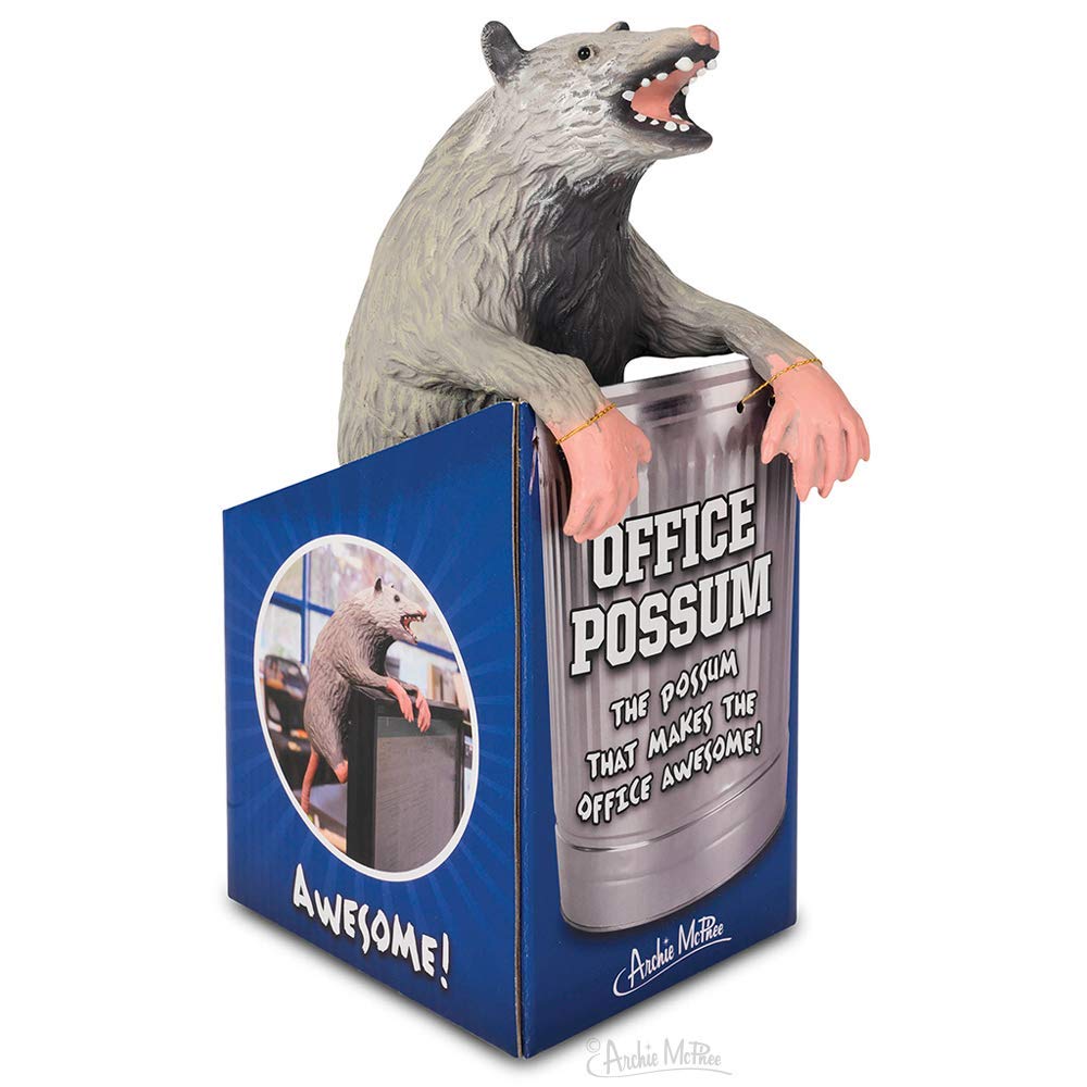 Archie McPhee Office Possum perched on a computer monitor