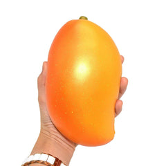 Areedy Jumbo Mango Squishy in hand supports tactile stress relief.