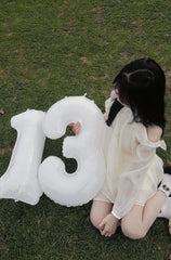 Argthjy 40-inch number 3 balloon close-up showing shiny foil finish.