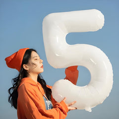 Argthjy number 5 black foil balloon creates dramatic photo backdrops
