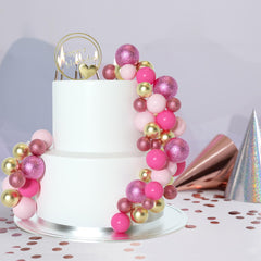 ASTARON gold ball cake topper adds elegant shimmer.