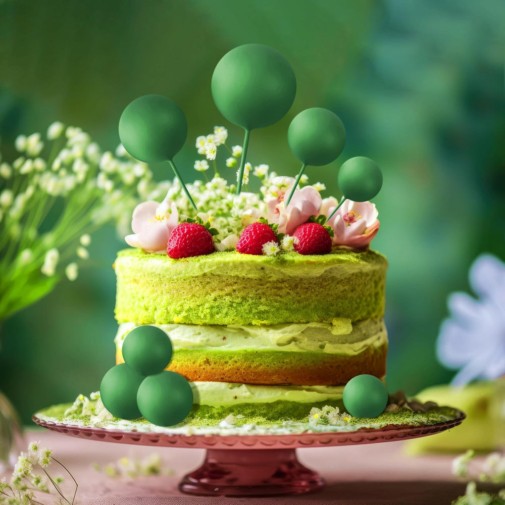 ASTARON party decorations featuring dark green ball toppers for celebrations.