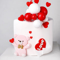 ASTARON toppers shown on cake edge with frosting details.