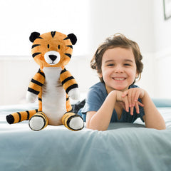 Attatoy Regit bedtime cuddler beside a pillow for nighttime rituals.