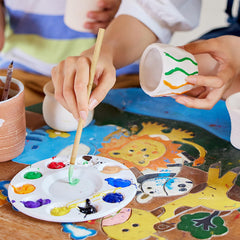 Aujazyble pottery wheel turning demo showing turntable art creation.