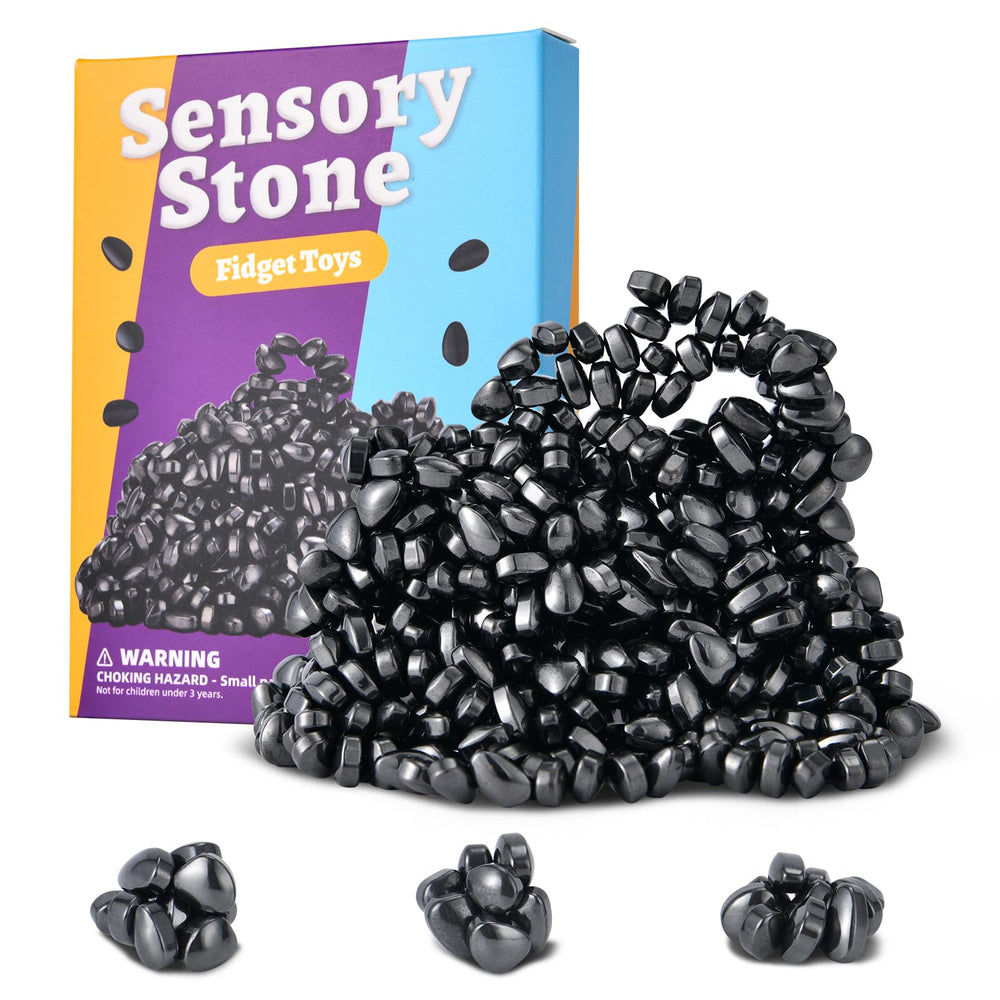 Aukit 550pcs fidget toys on a desk spread, encouraging focus during work.