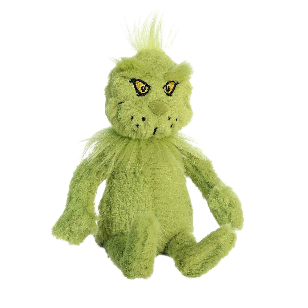 Aurora Grinch plush close-up of eyes highlighting friendly character appeal for kids.