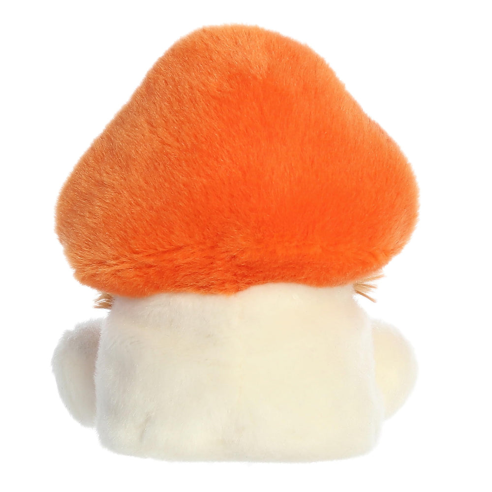 Aurora Fabian Fluffy Mushroom in hand demonstrates palm-sized portability and play.