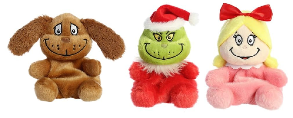 Aurora Palm Pals Max plush held in hand for cozy storytelling and playful companion.
