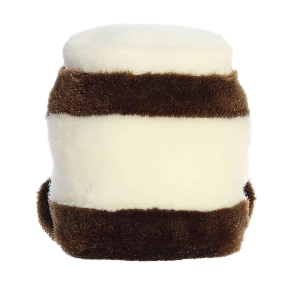 Aurora Palm Pals Silky Chocolate Spread plush on a shelf adds cozy room decor.
