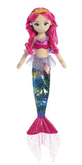 Aurora Sea Sparkle doll with glitter tulle adds festive flair during celebrations