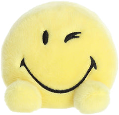 Aurora SmileyWorld Palm Pals Wink yellow handheld size ideal for travel and pocket hugs.