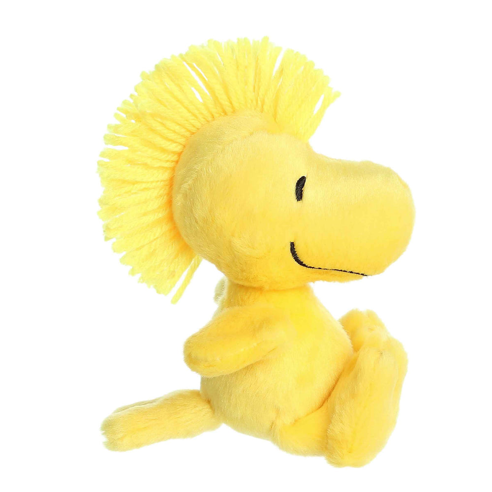 Aurora Woodstock plush with floppy legs for playful posing and hugs.