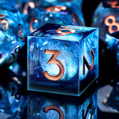 AUSTOR liquid core DND dice set in display box showing vibrant quicksand visuals