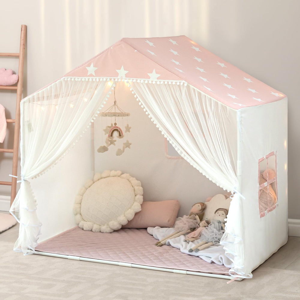 Avrsol pink door curtains open for easy access and imaginative entry.