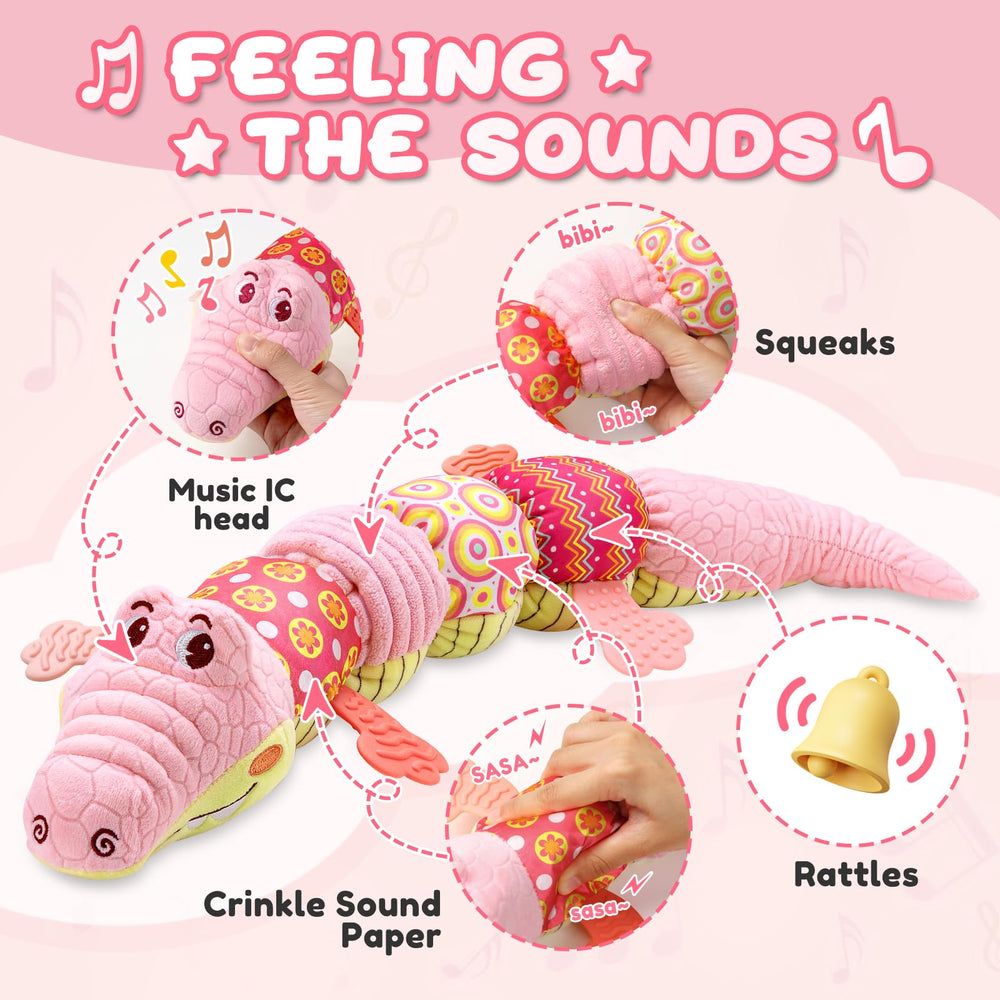 AWOTOY crocodile musical toy pink crinkle detail enhances auditory curiosity.