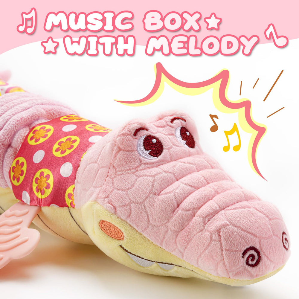 AWOTOY crocodile musical toy pink textures invite touch and sensory play.