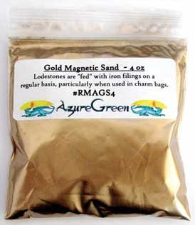 AzureGreen Gold Magnetic Sand beside a lodestone for money-drawing ritual support