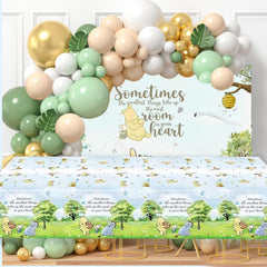 Winnie bear-themed tablecloth serves as a backdrop or decor.